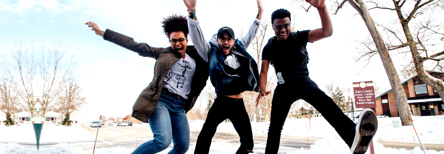 a group of university students having fun using their no annual fee credit cards